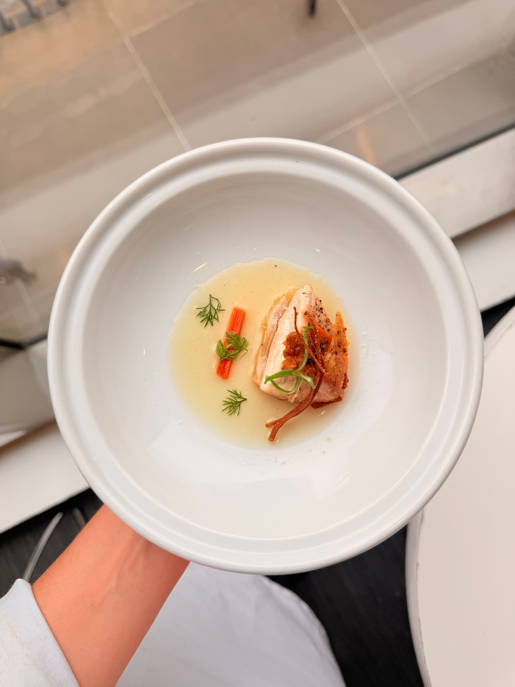 A small plated dish in a white bowl